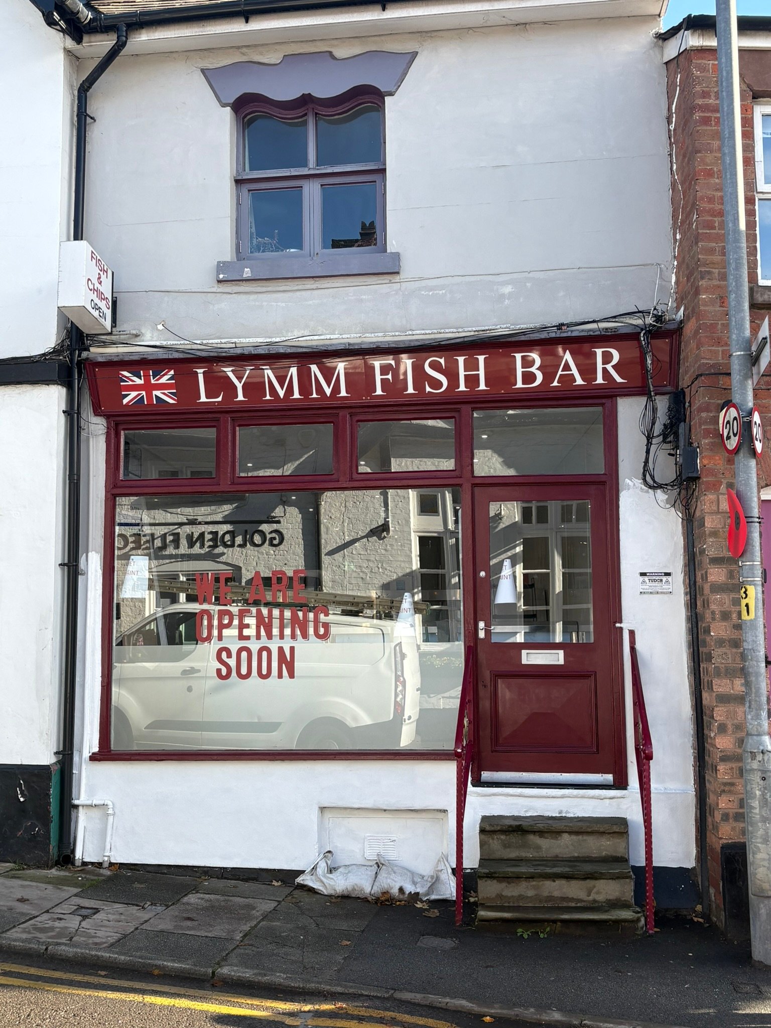 Lymm Fish Bar completed shopfront — finished signage viewed from the street